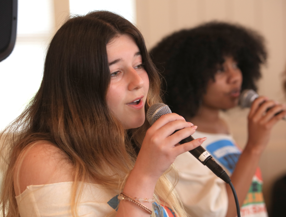 Members of the Monterey Jazz Regional All-Star Vocal Ensemble performing
