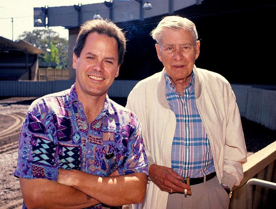 Tim Jackson and Jimmy Lyons standing by an empty arena