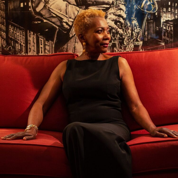 Carmen Lundy sitting on a couch