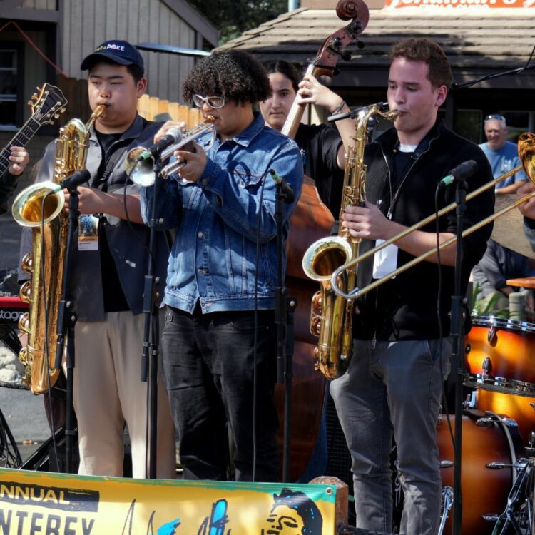 High School Student Jam session participants performing on stage