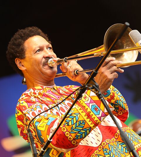 Delfeayo Marsalis playing trumpet on stage