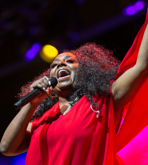 Ledisi performing on stage