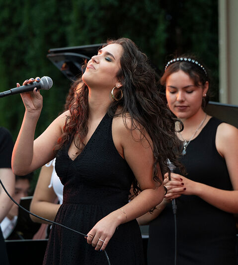 Members of Monterey Jazz Regional All Star Vocal Ensemble performing