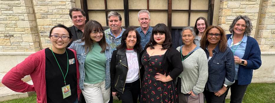 people standing on a lawn