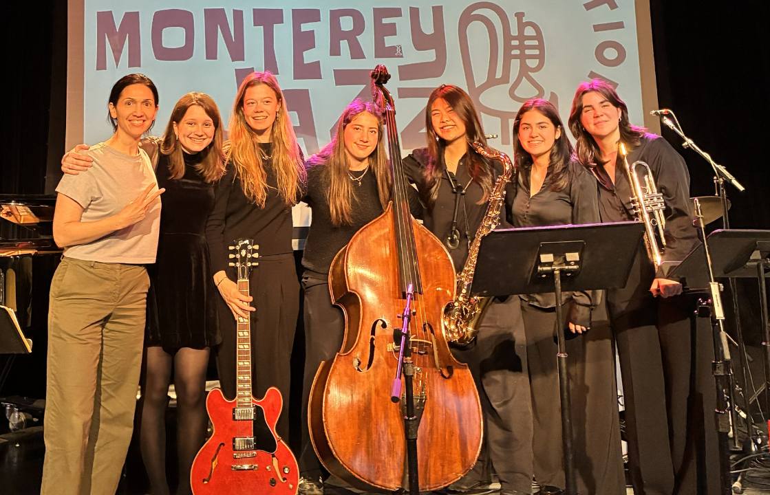 a group of women on a stage