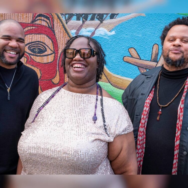 Three people standing