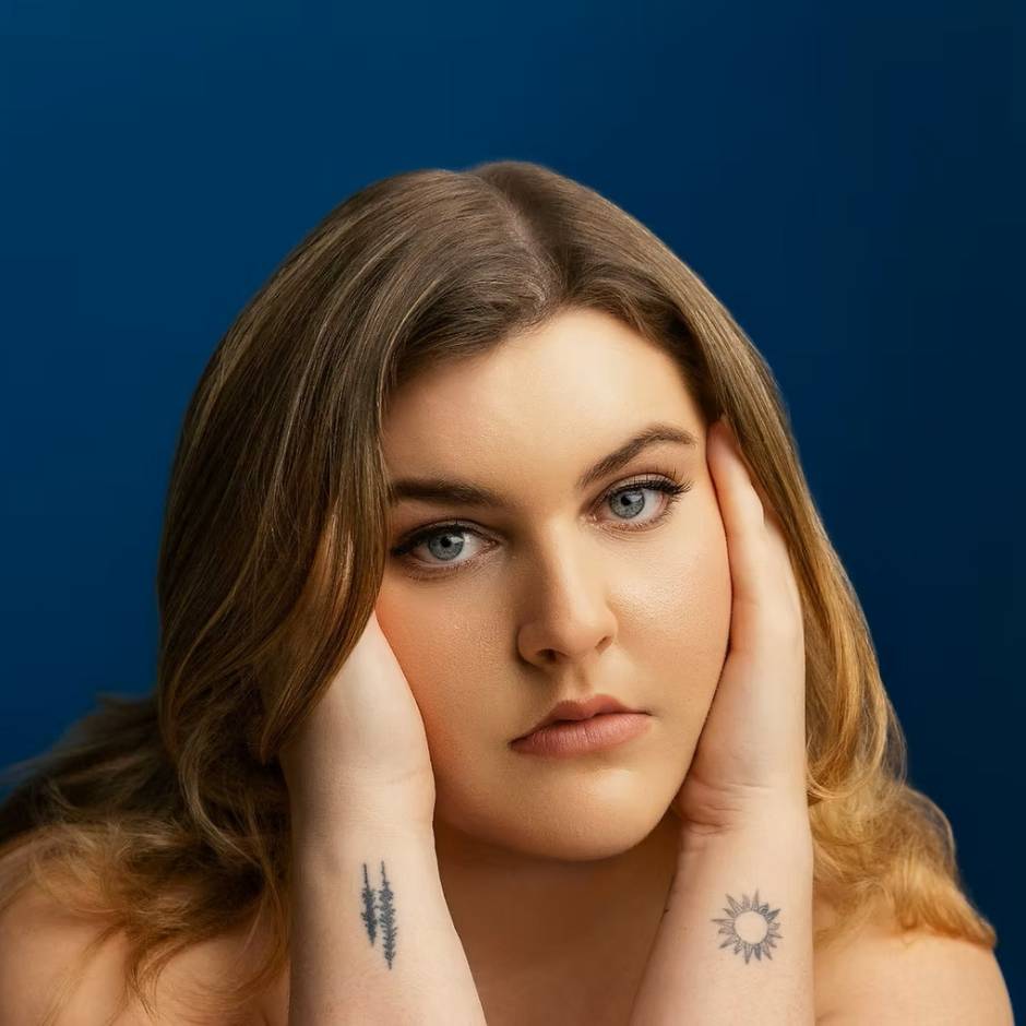 A woman looking at the camera