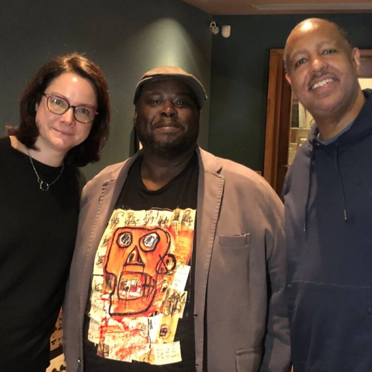 Three people standing
